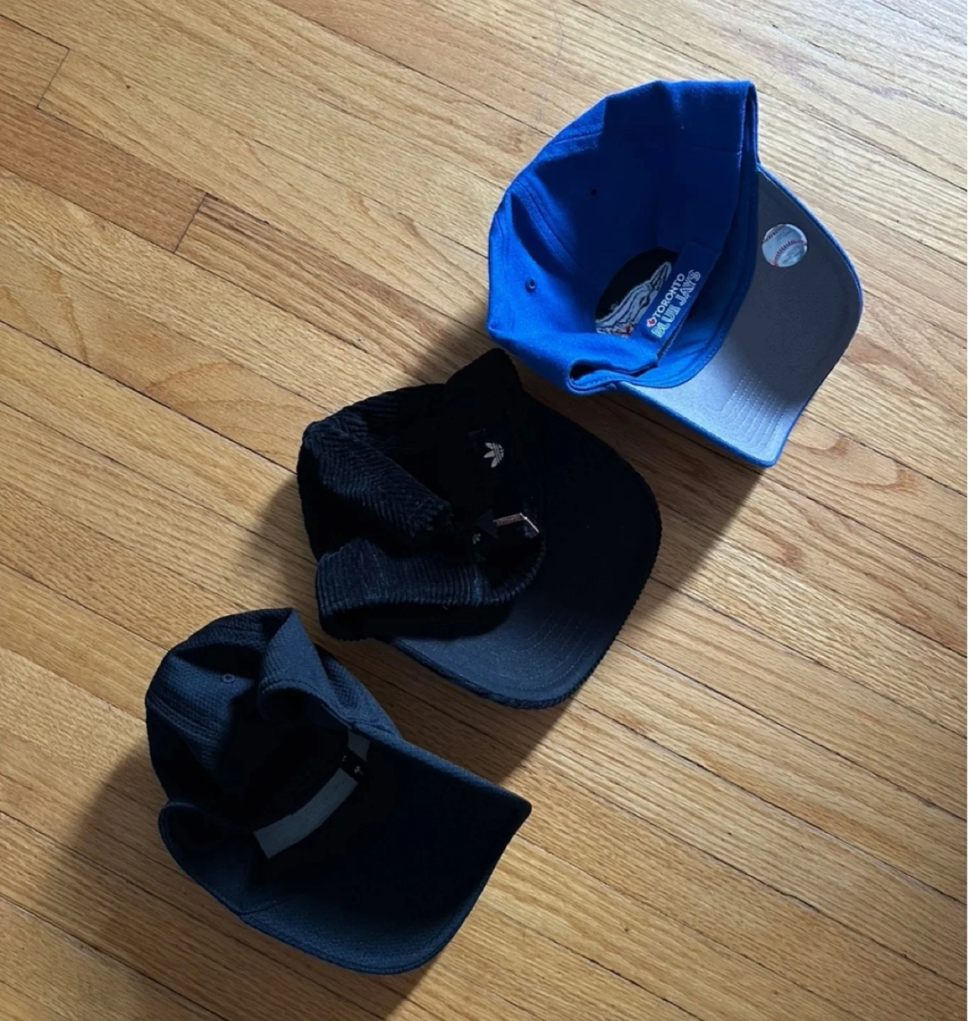 Assorted Hats: Blue Jays, Adidas, Under Armour image indicator(2)