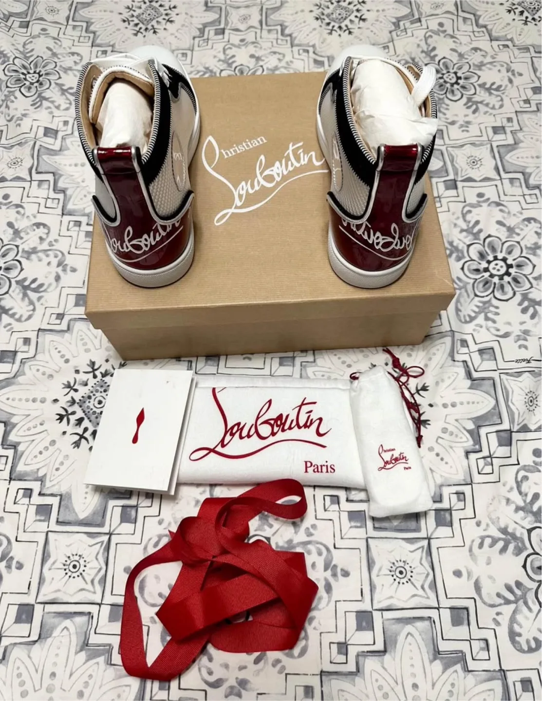 Christian Louboutin High-Top Sneakers image indicator(2)