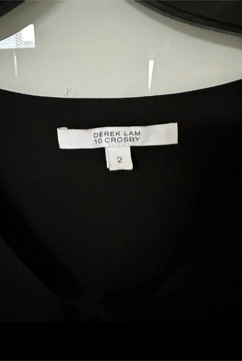 Selling brand new Derek Lam black silk top in size 2 image indicator(3)