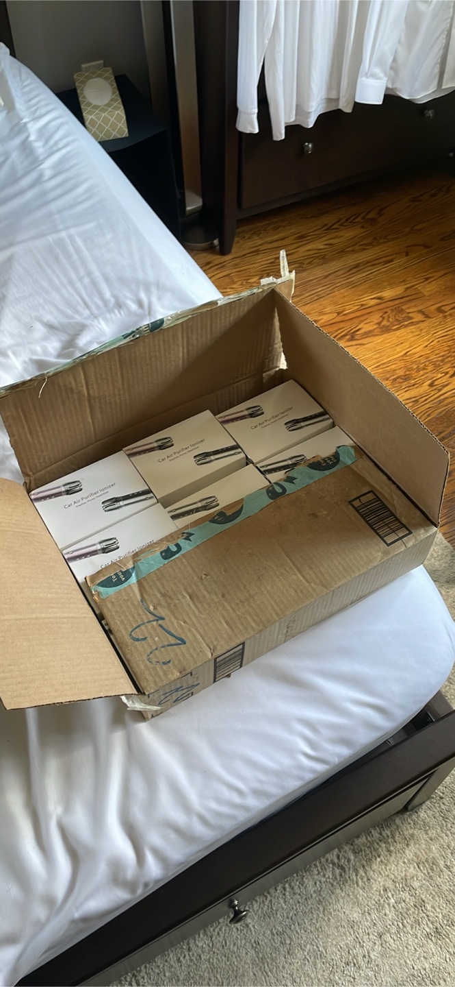 (18)Box of car air purifiers super cheap