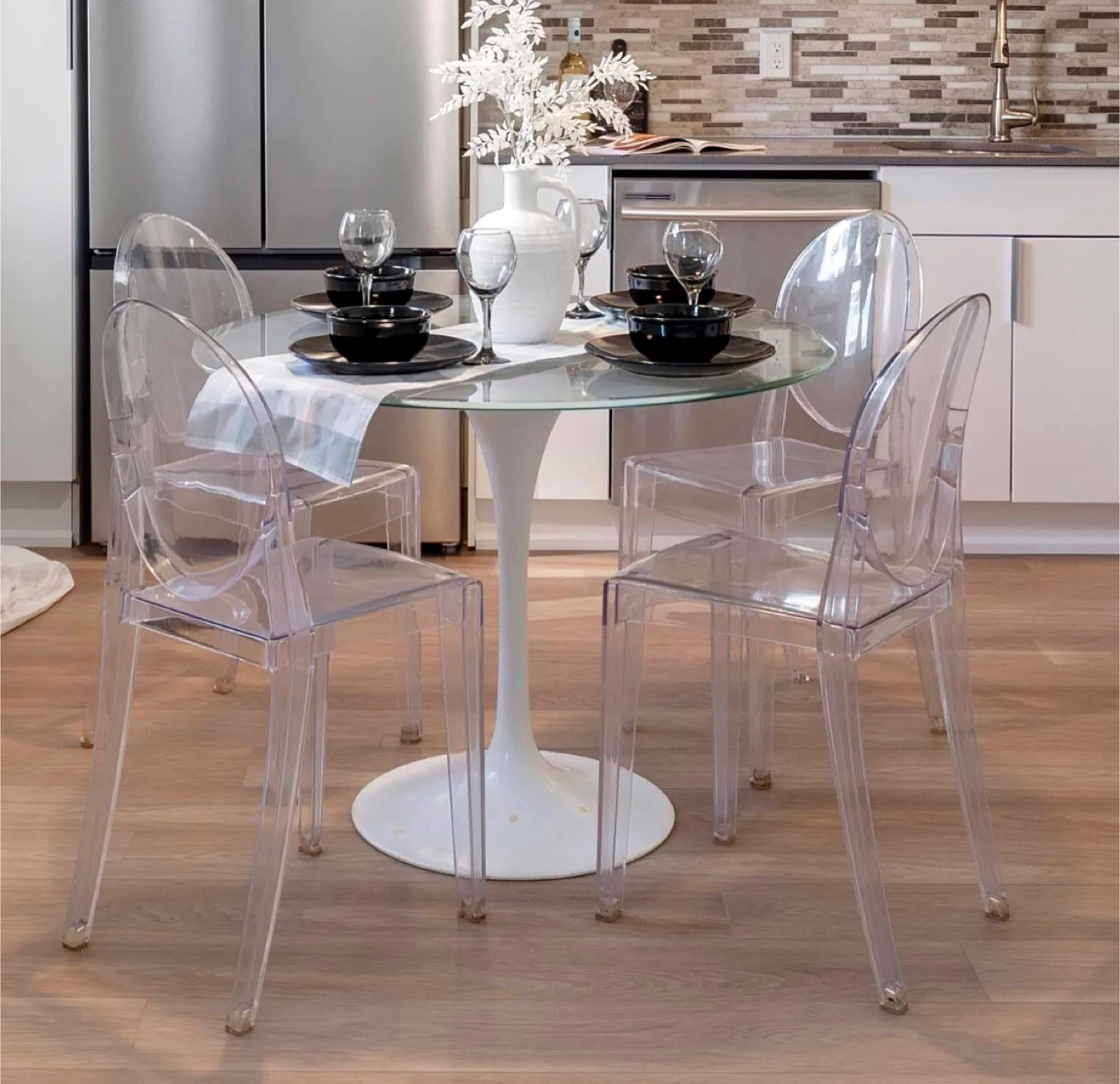 Round Glass Dining Table with Ghost Chairs thumbnail