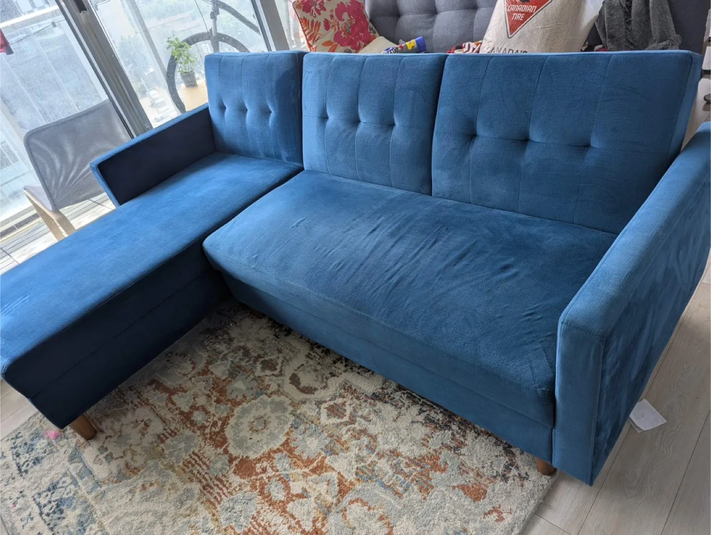 Blue Sectional Sofa with Ottoman image indicator(2)