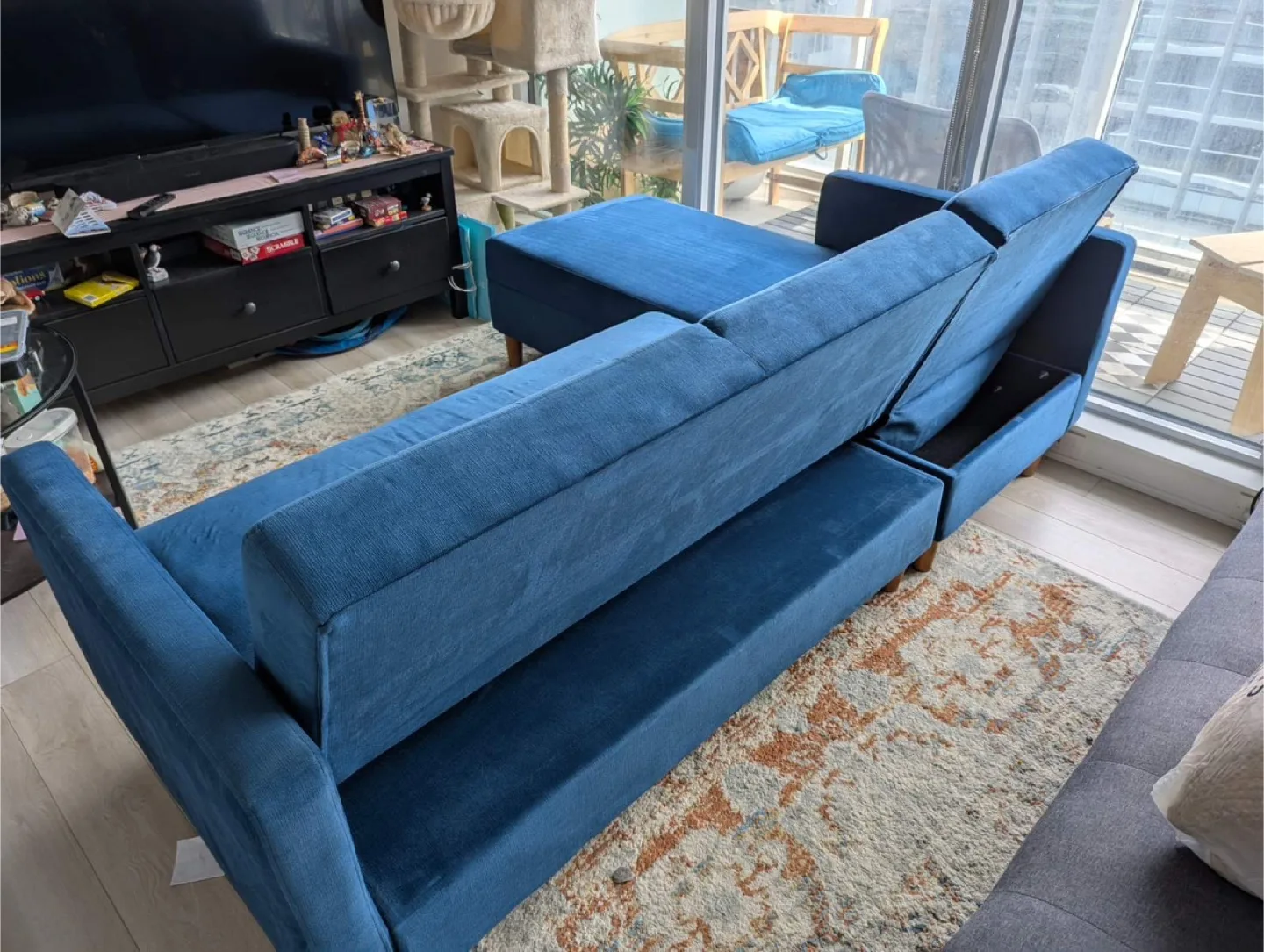 Blue Sectional Sofa with Ottoman image indicator(3)