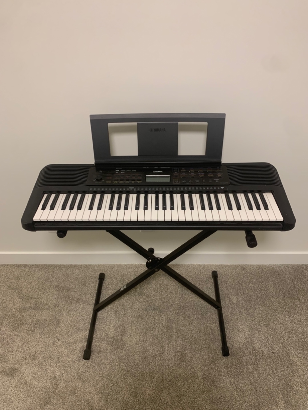 YAMAHA PIANO WITH STAND $150