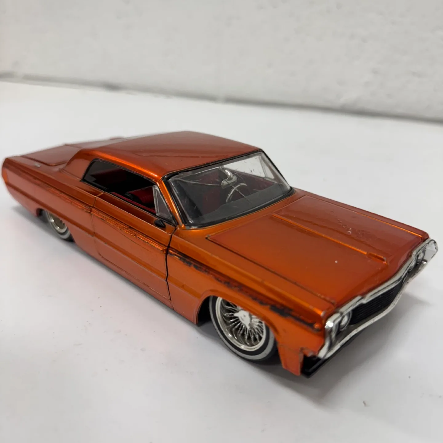 Diecast 1964 Chevy Impala – Orange Lowrider thumbnail