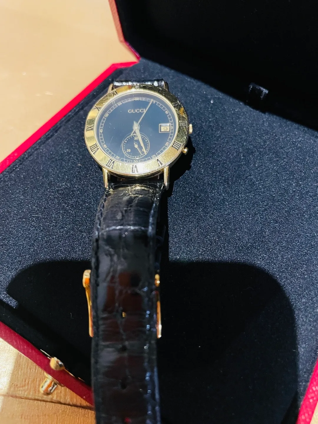 Gucci Gold Watch with Black Leather Strap thumbnail
