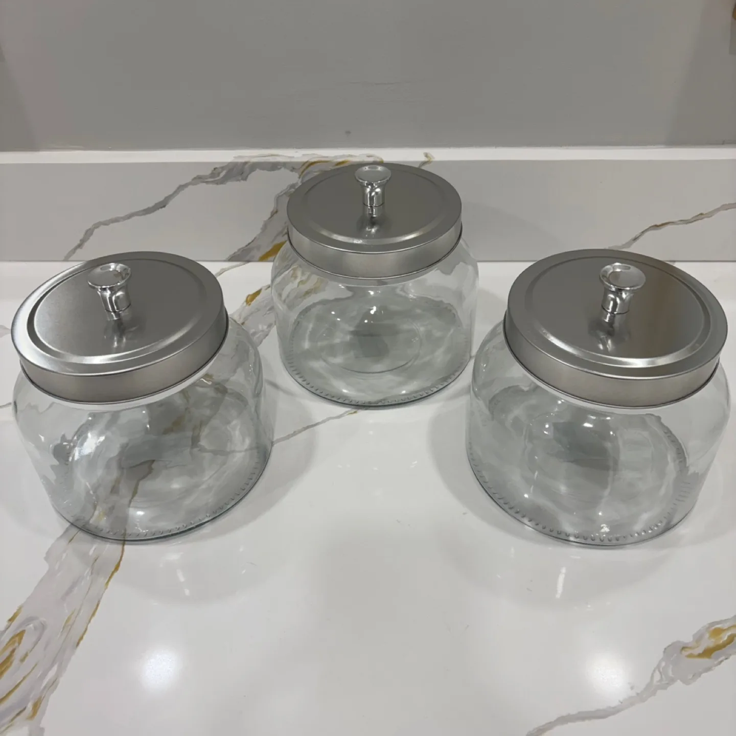 Set of Glass Jars with Silver Lids image indicator(2)