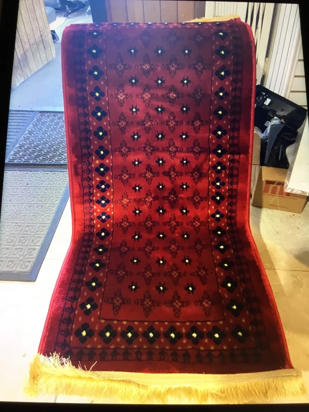 Red patterned area rug thumbnail
