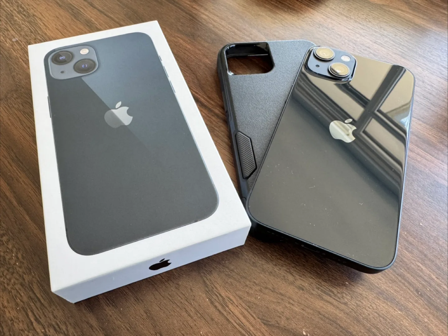 iPhone 13 Midnight with Otterbox Case thumbnail