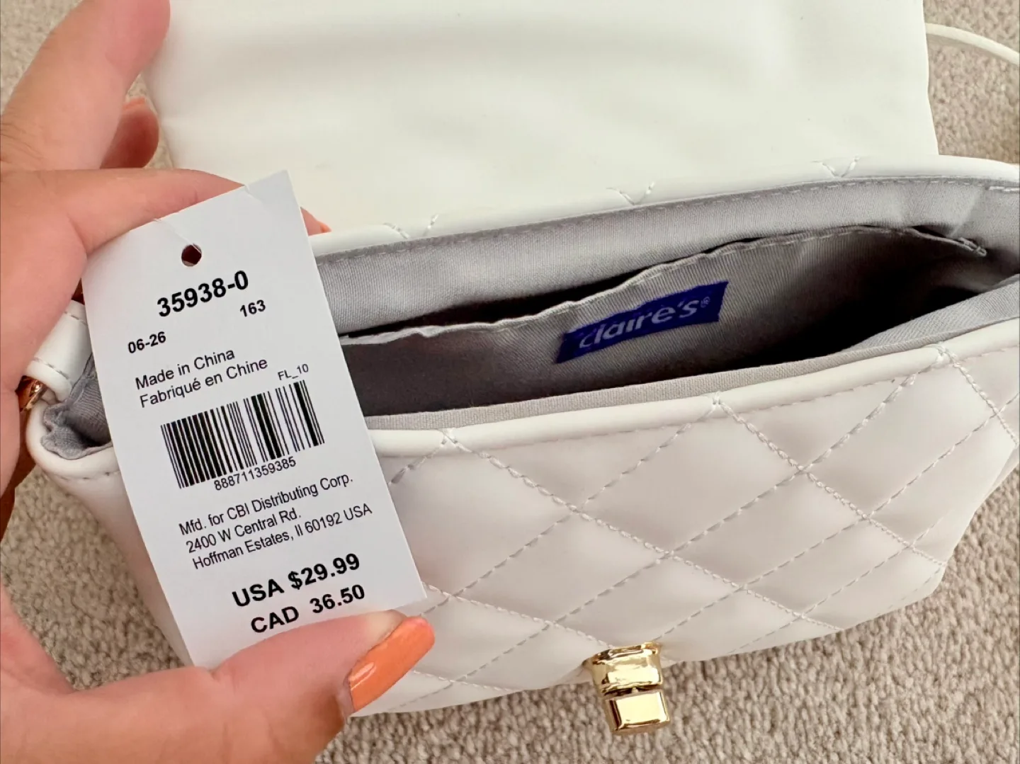 Claire's White Quilted Crossbody Bag image indicator(2)