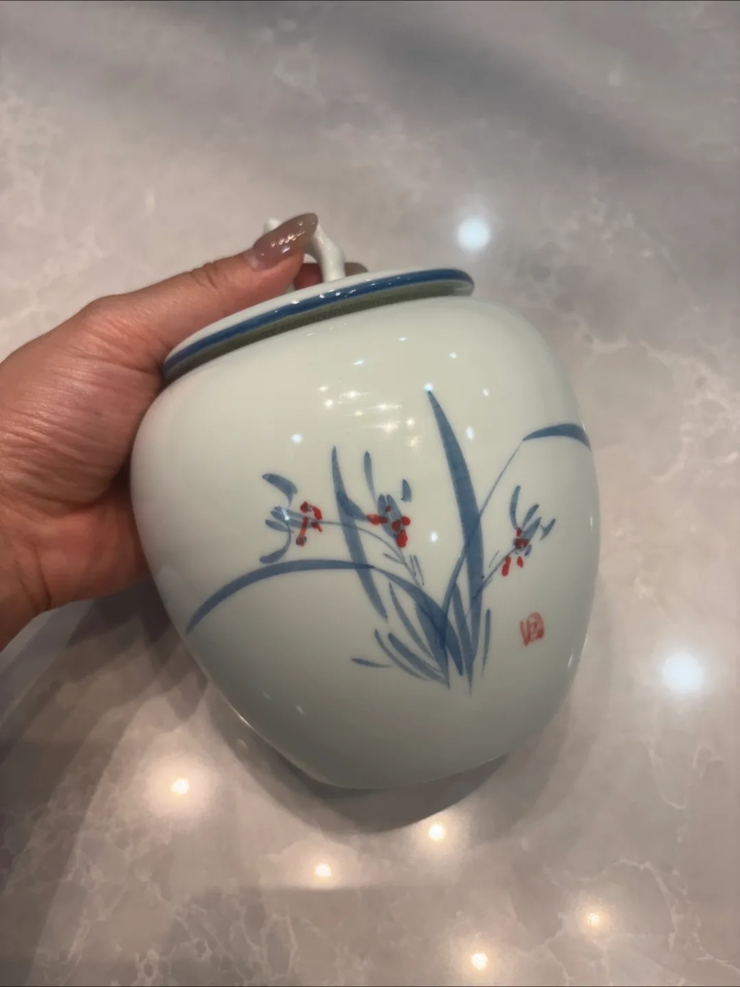 White Ceramic Jar with Floral Design thumbnail