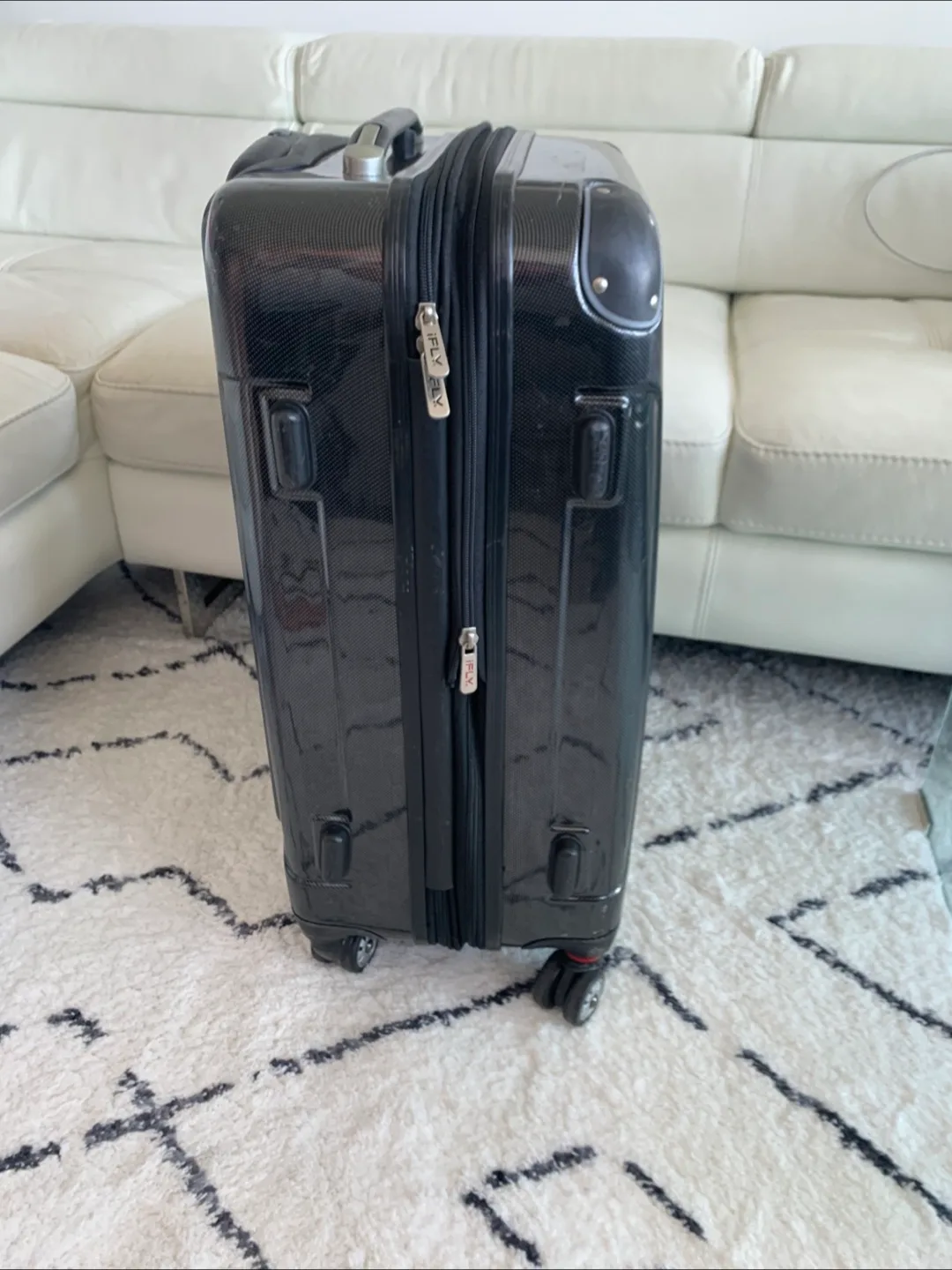 Excellent Black Shiny Hardshell Suitcase - “iFly” image indicator(4)