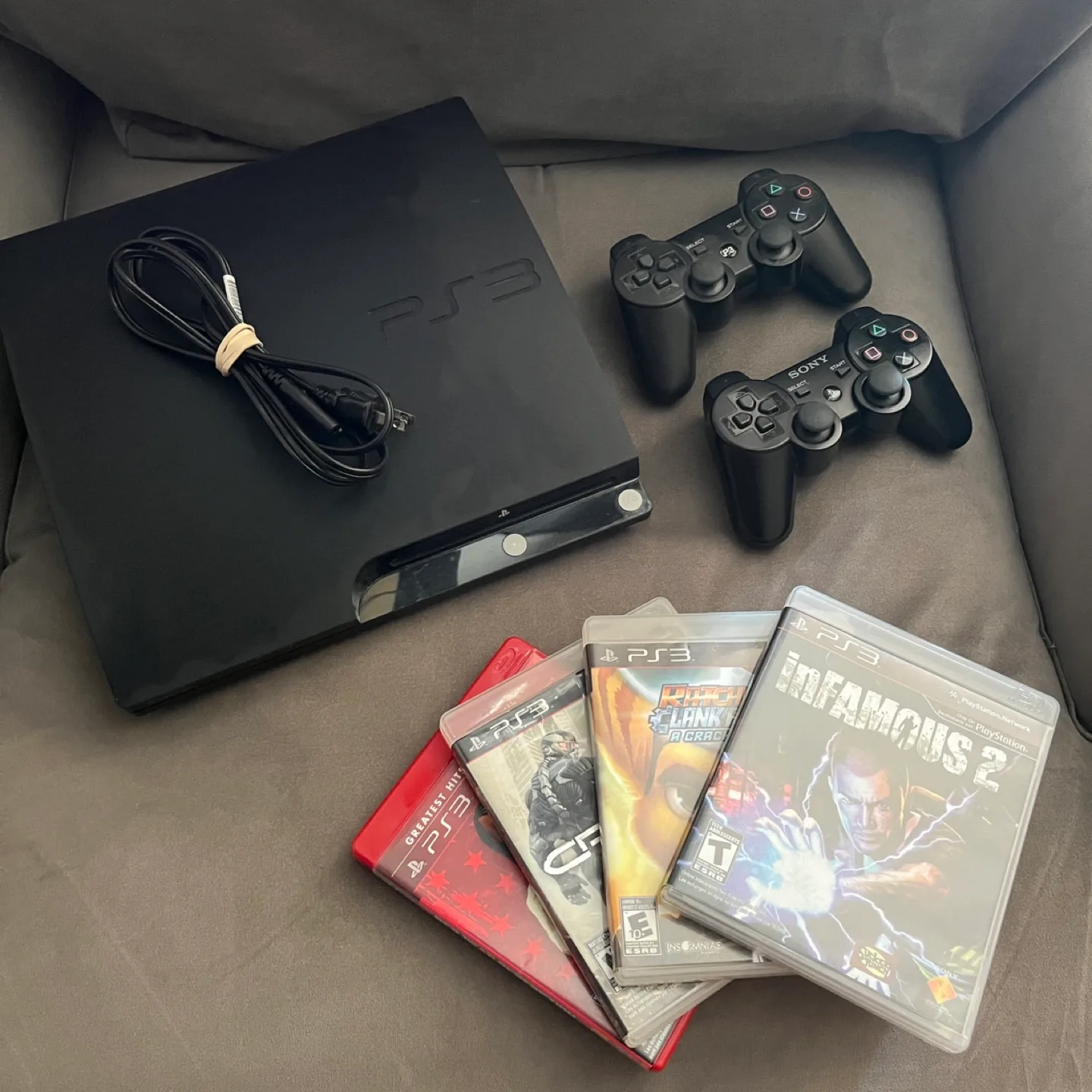 PS3 Slim 120GB Bundle – 2 Controllers + 4 Games – Fully Working thumbnail