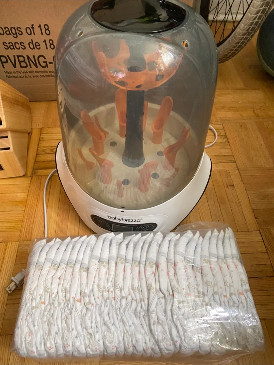 Moving out sale Baby breeza bottle sterilizer with diaper 26pcs thumbnail