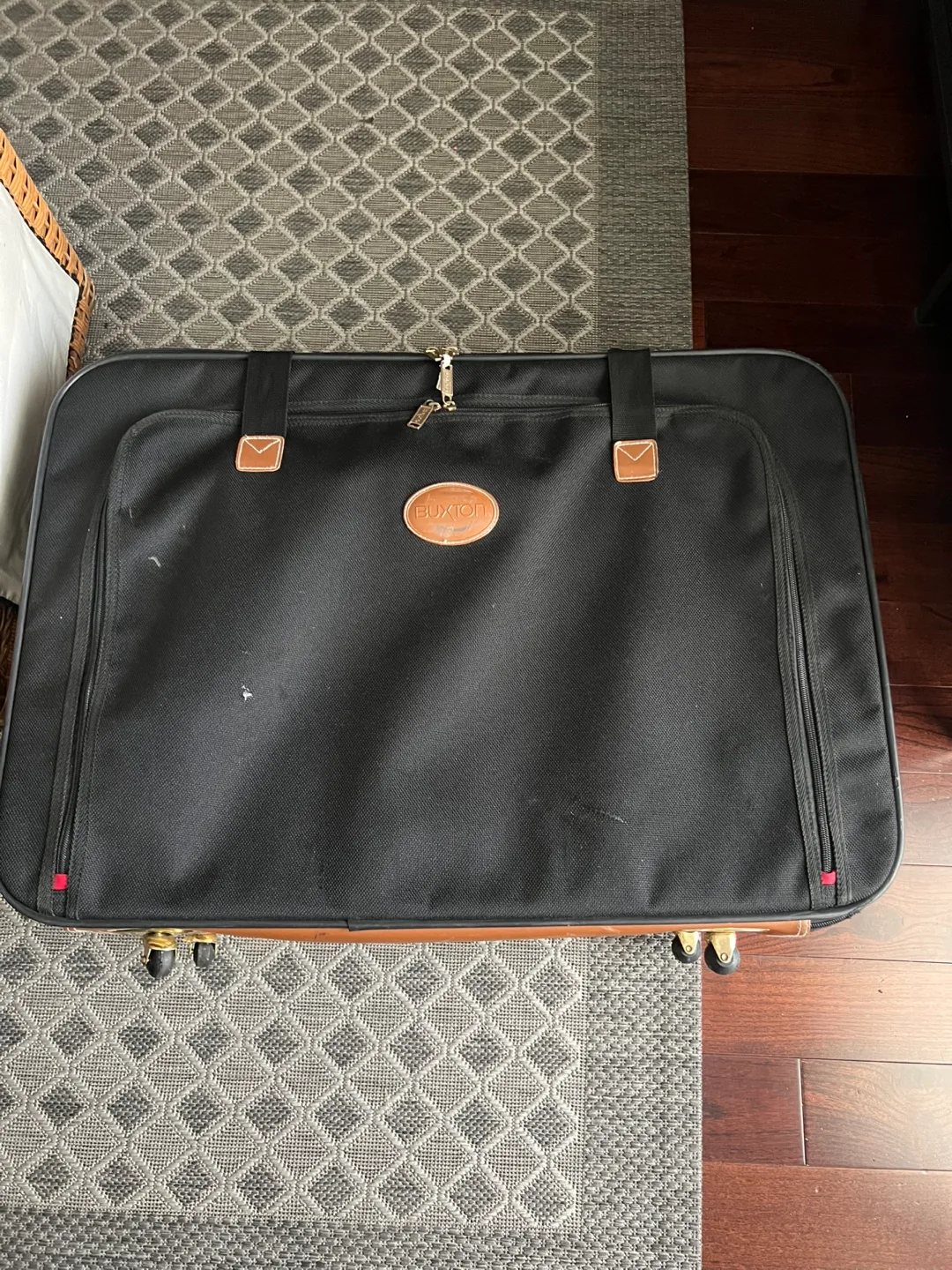 3  items Buxton Rolling Luggage, Garment Bag & Black thumbnail