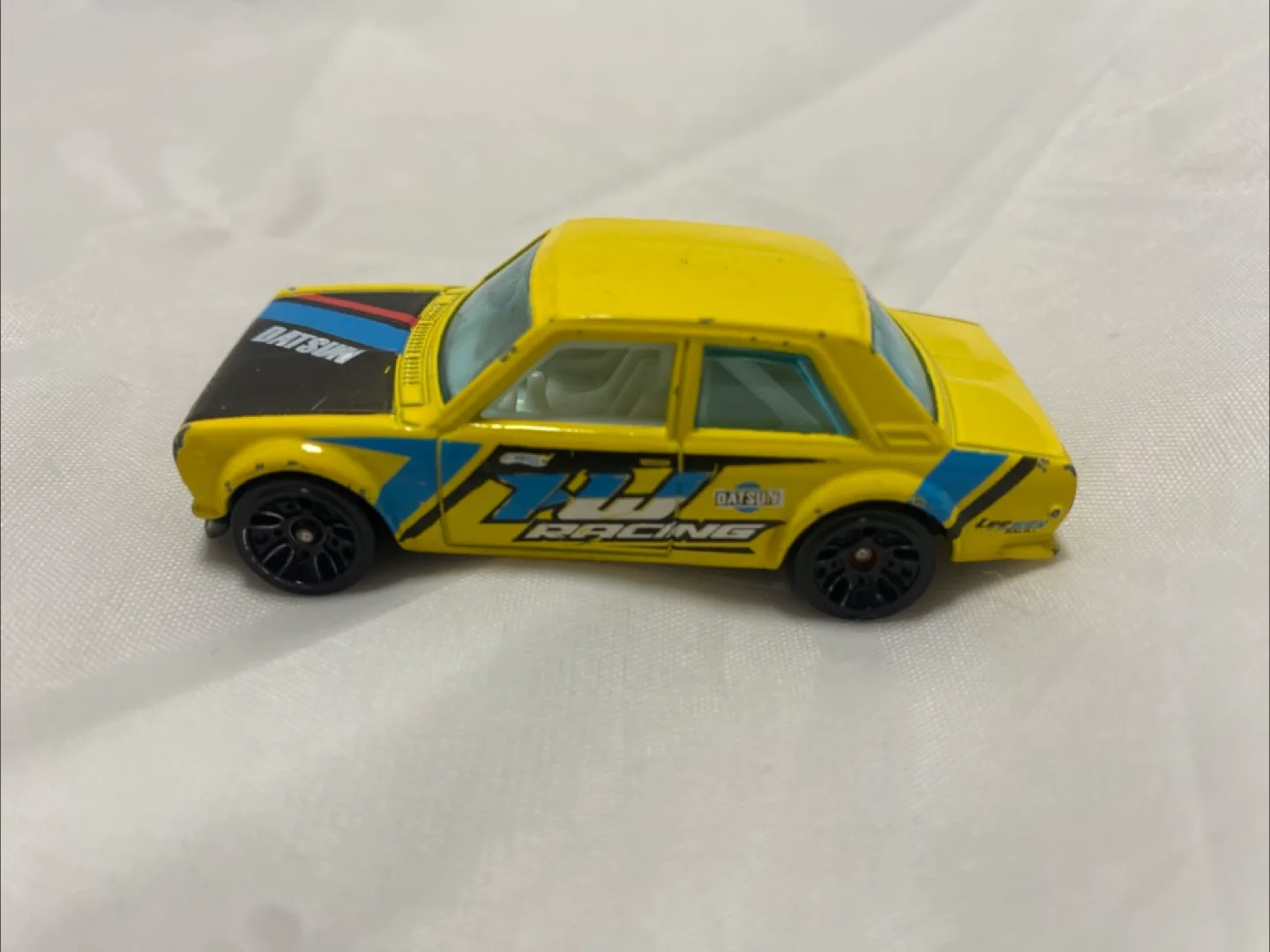 Hot Wheels 2011 Nightburnerz 9/10 Datsun Bluebird 510 in Yellow thumbnail