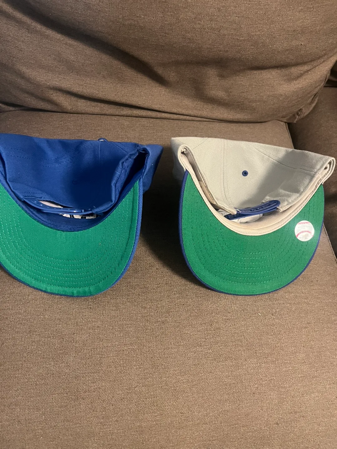 Blue jays and Dodgers hats image indicator(4)