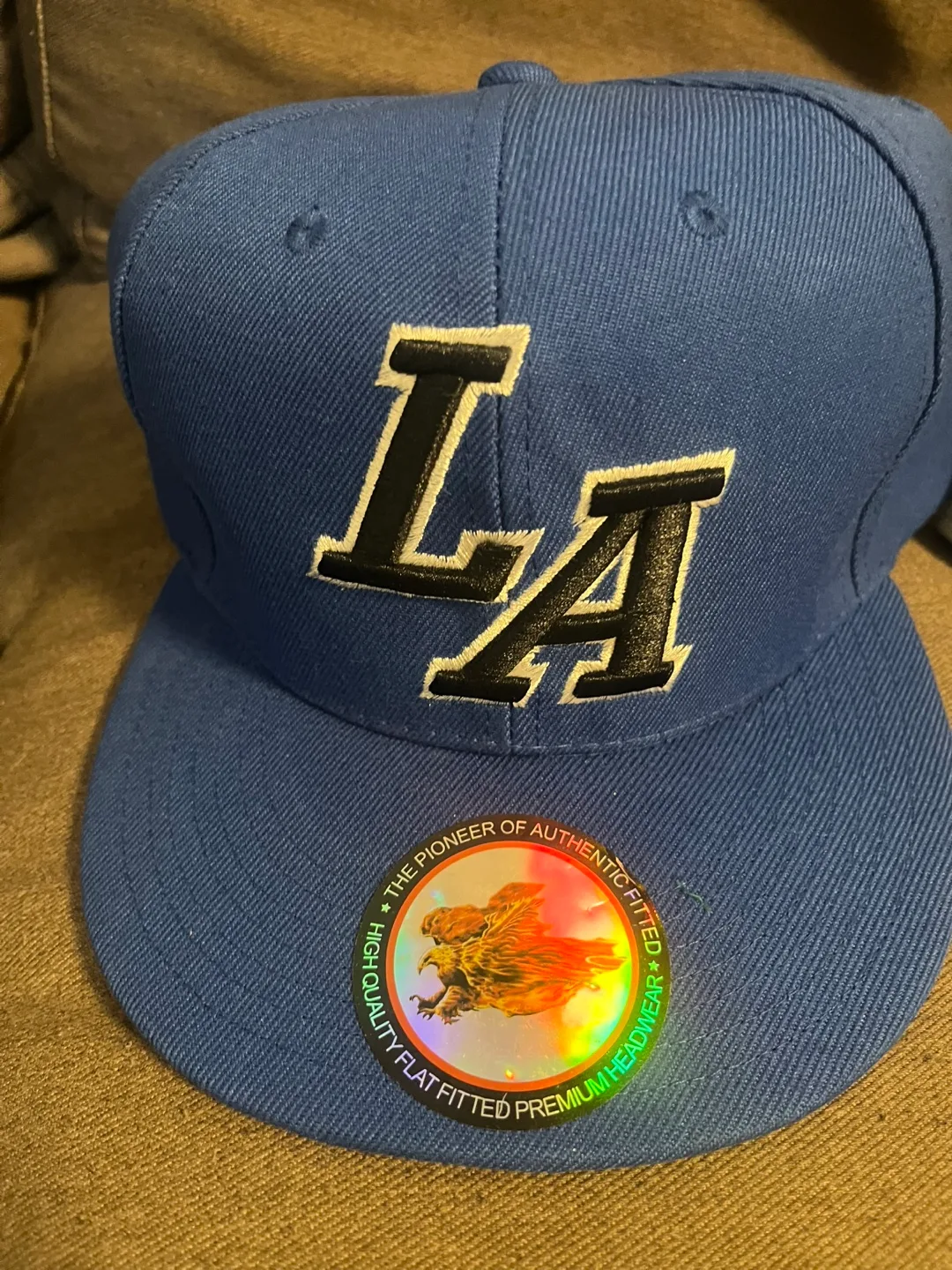 Blue jays and Dodgers hats image indicator(2)