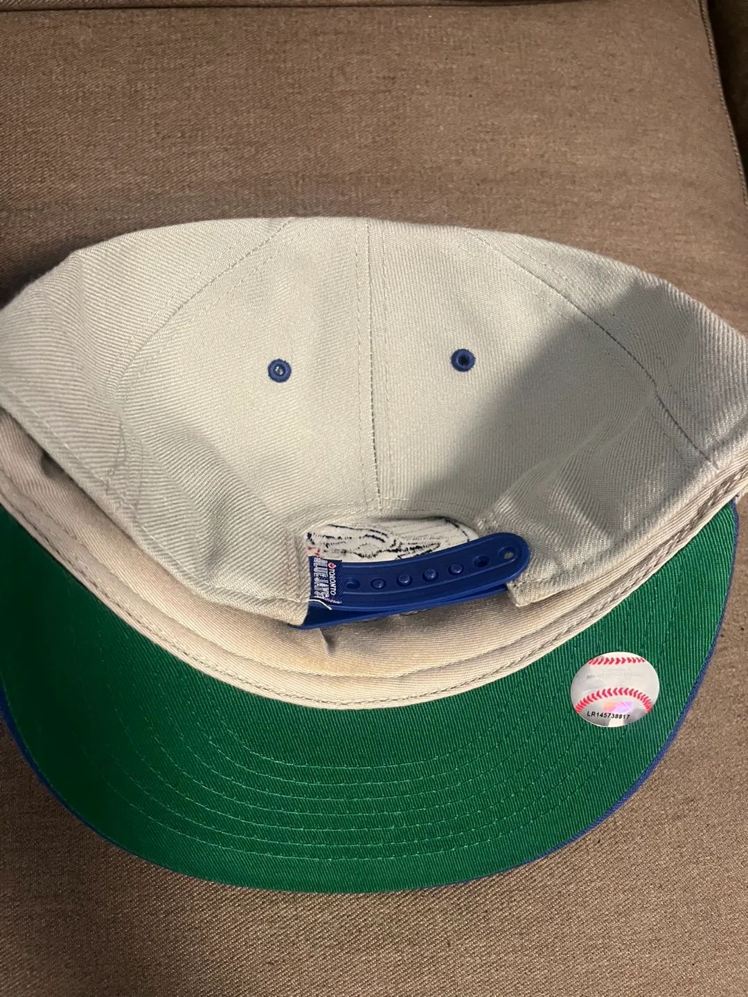 Blue jays and Dodgers hats image indicator(5)