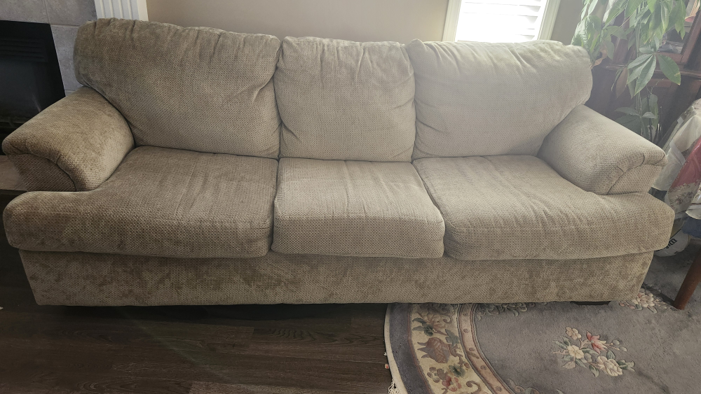 Comfortable Beige Three-Seat Sofa