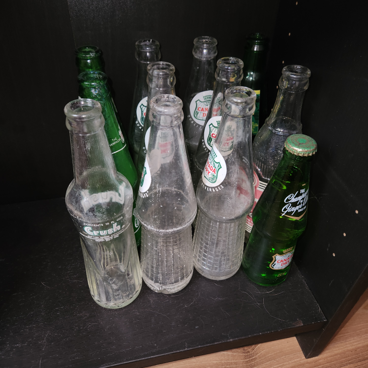 12 collectable Vintage Canada Dry & Crush Soda Bottles