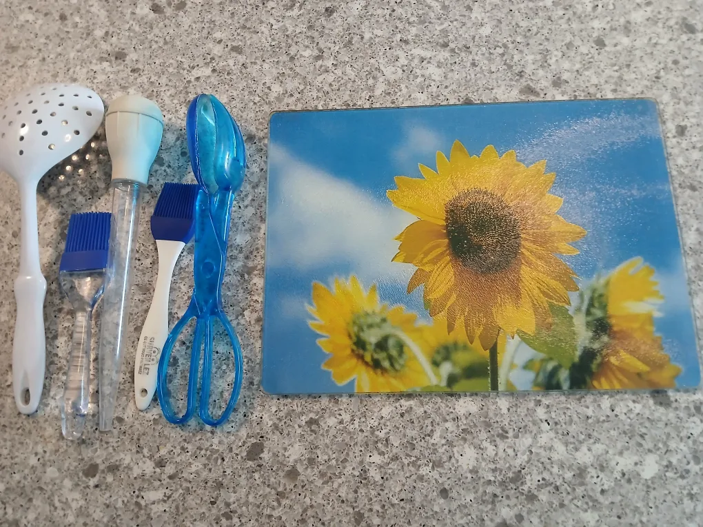 Kitchen Utensils & Sunflower Cutting Board. It's available. thumbnail