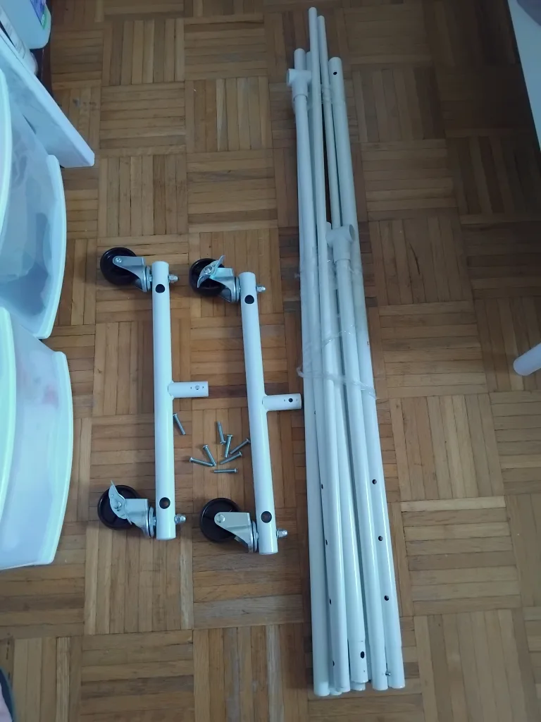 Heavy duty clothes rack with wheels. thumbnail