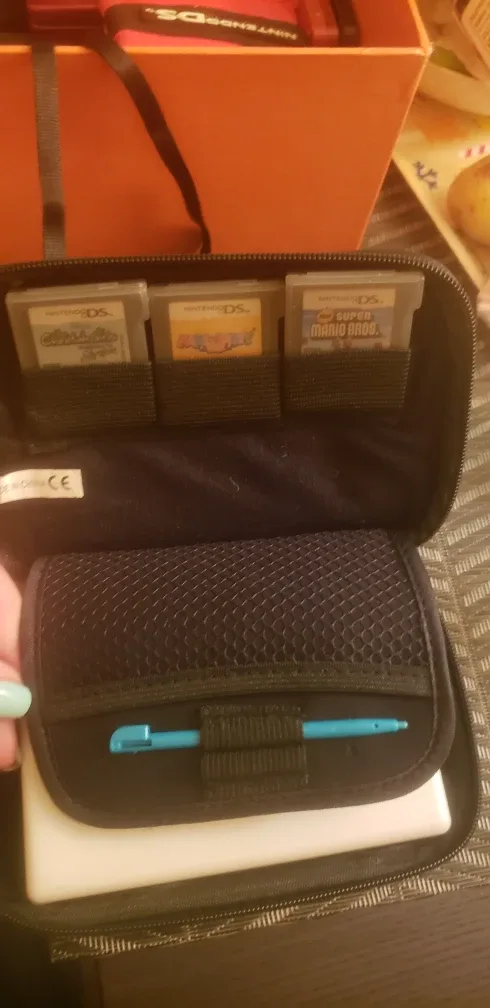 Nintendo DSi with Games and Case image indicator(3)