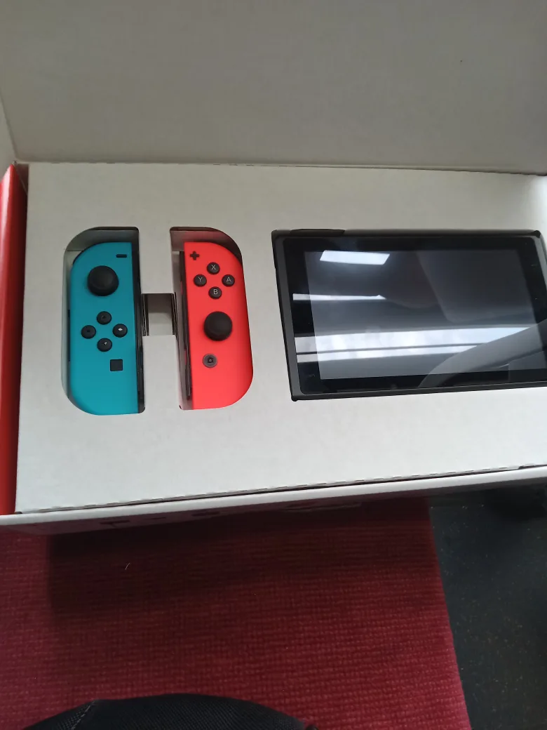 Nintendo Switch with Neon Blue and Red Joy-Con image indicator(3)