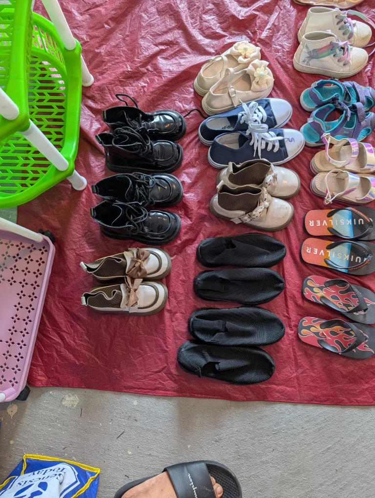 garage sales . kids shoes and adults shoe image indicator(2)