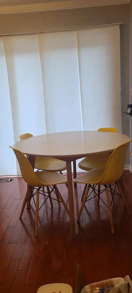 Round Dining Table with Yellow Chairs thumbnail
