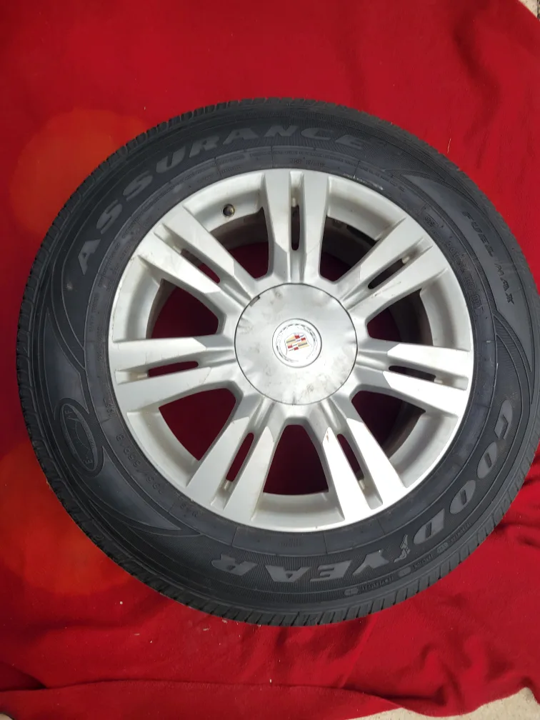 USED TIRE AND RIM FROM CADILLAC SRX.  235 65 18 thumbnail