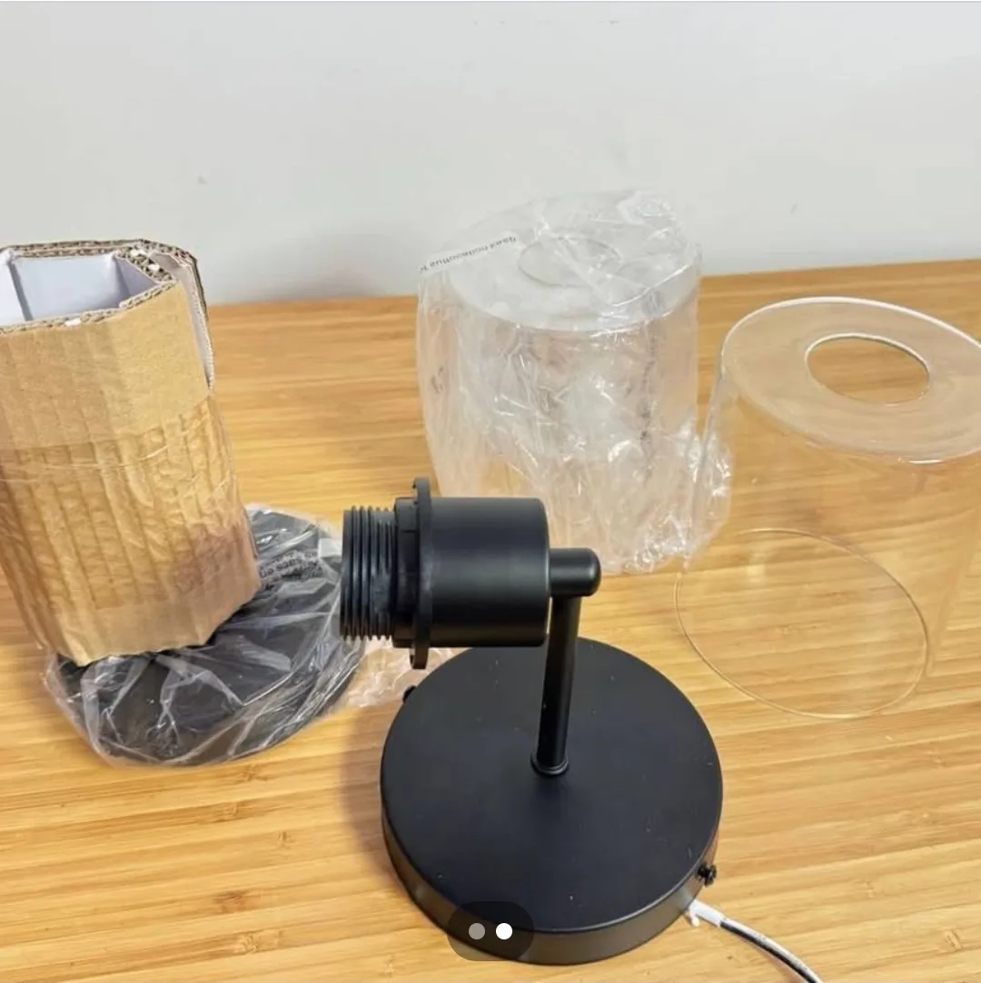 A Pair of Black Wall Sconce with Clear Glass Shade image indicator(2)