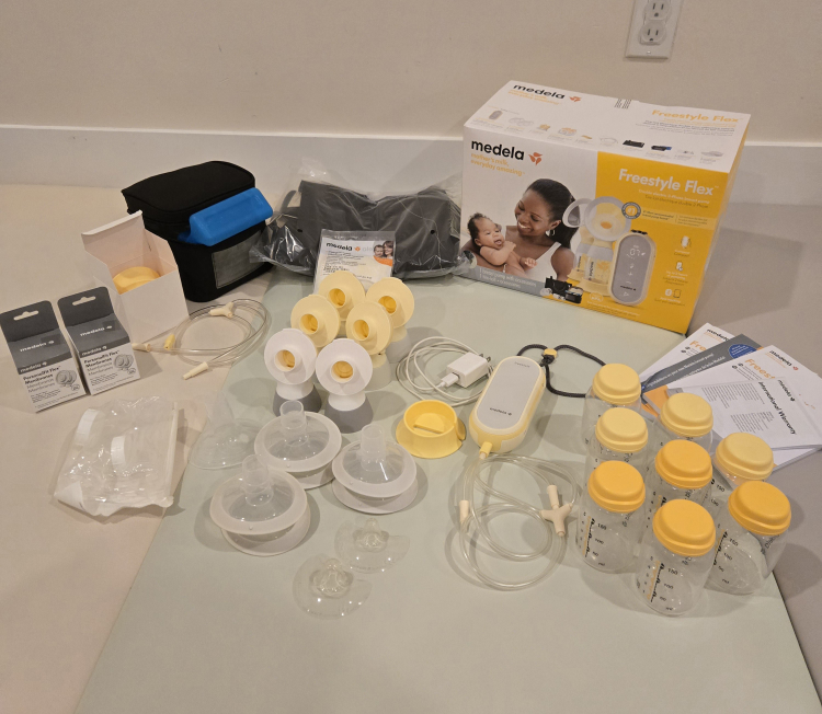Medela Freestyle Breast Pump with many Accessories