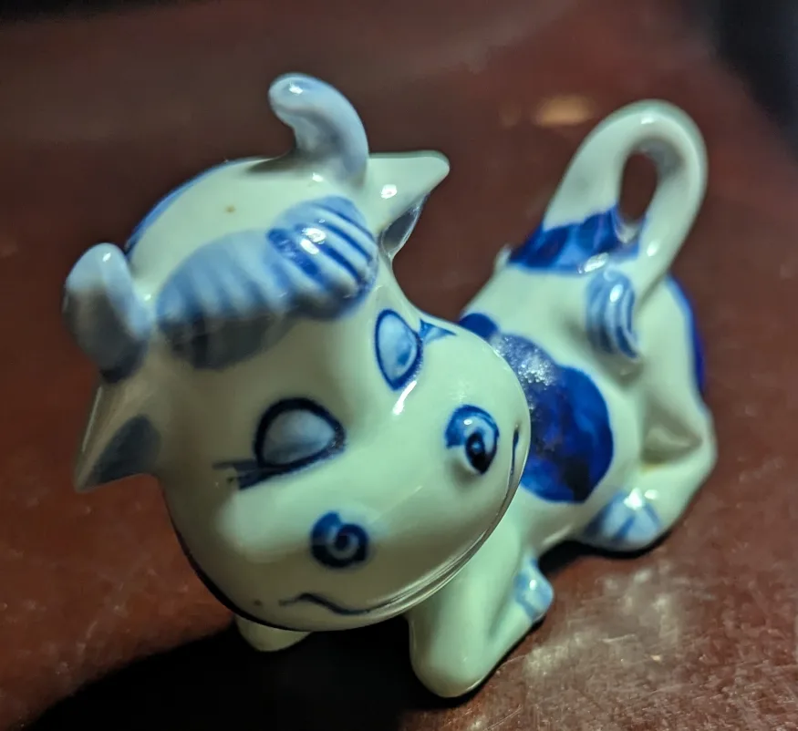 Blue and White Ceramic Cow Figurine thumbnail