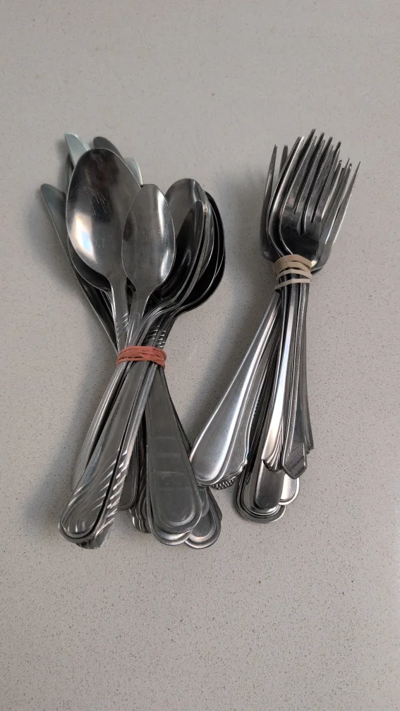 A somewhat mismatched set of cutlery thumbnail
