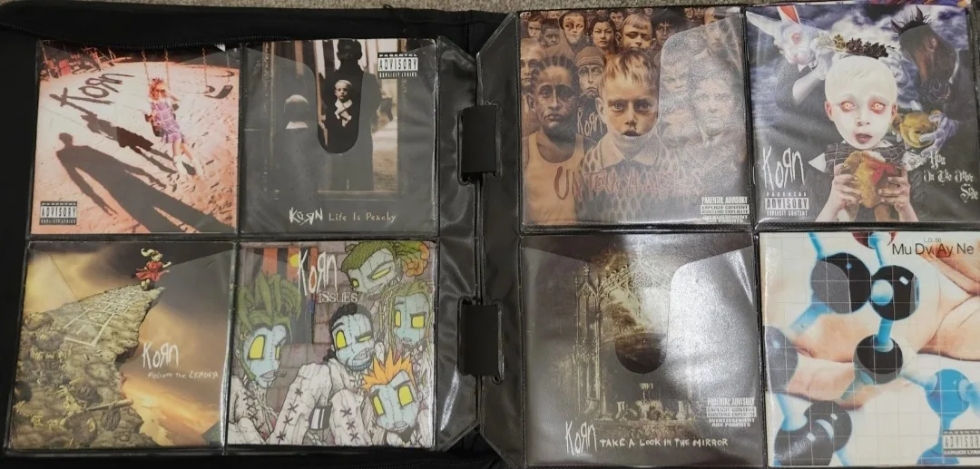 87 Mixed Cds in Binder thumbnail