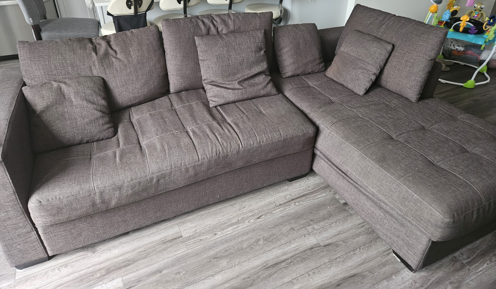 Brown Sectional Sofa with Pillows