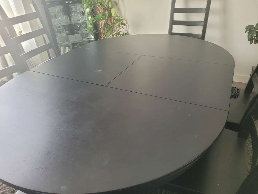 Ikea Black Extendable Oval Dining Table with chairs