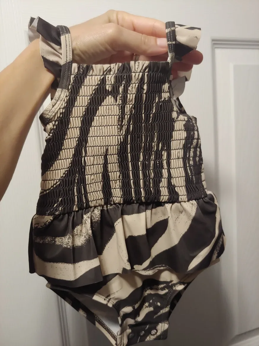 Like New 9 month baby swimsuit and cover up image indicator(2)