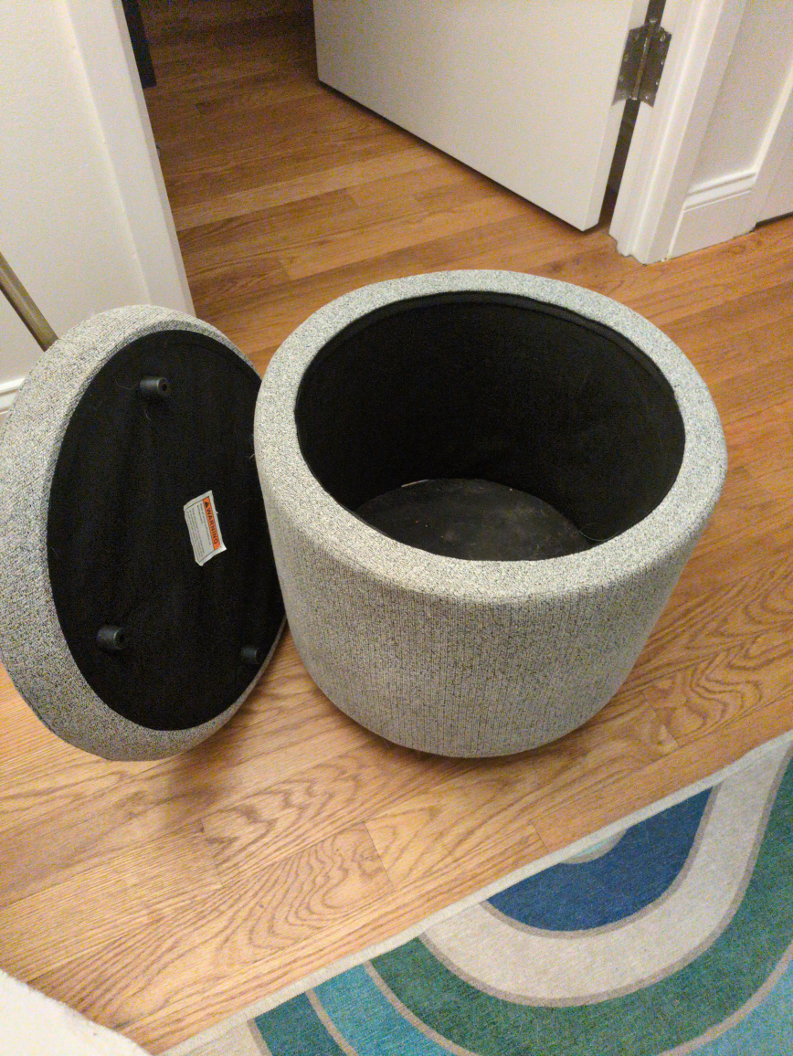 Gray round storage ottoman