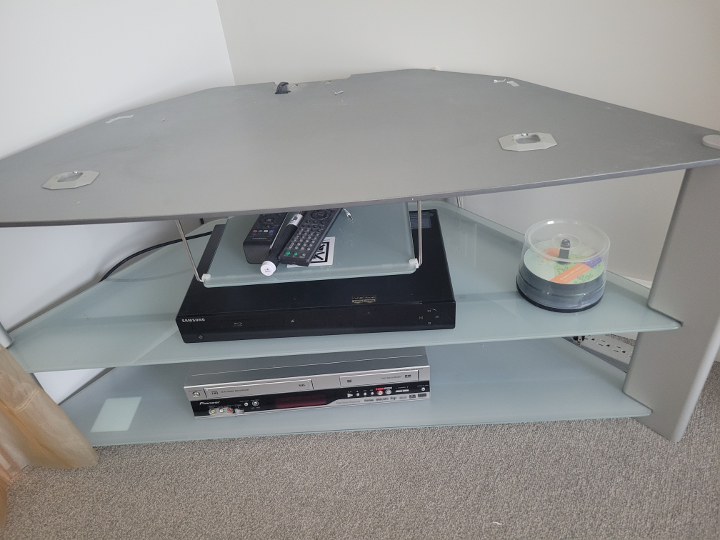 Free -Corner TV Stand - Glass Shelves