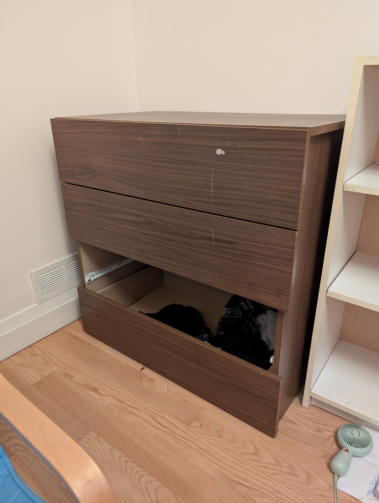 Damaged Brown Wooden Dresser