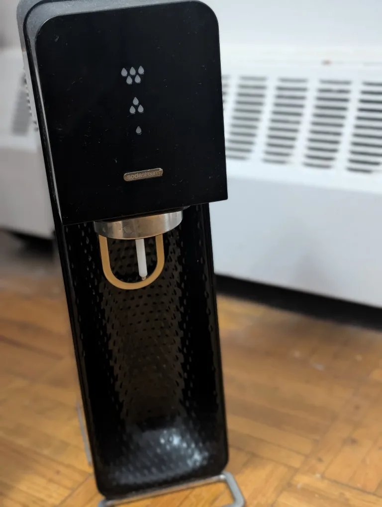 SodaStream Sparkling Water Maker and soda can thumbnail
