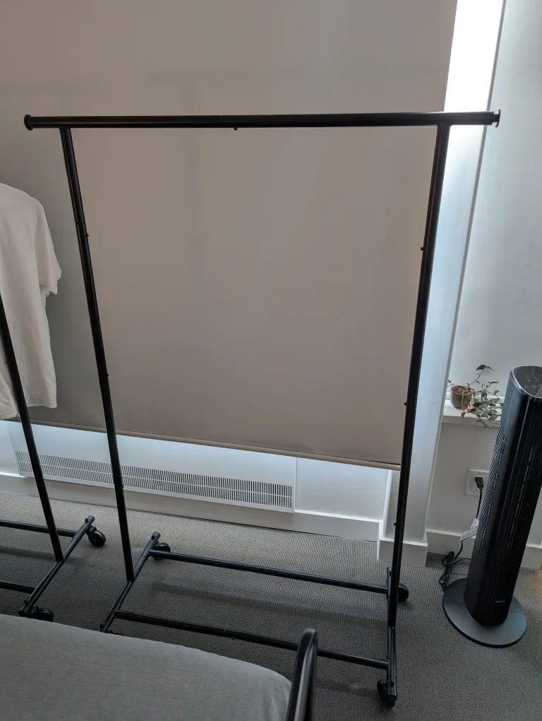 Two Heavy Duty Rolling Garment Racks thumbnail