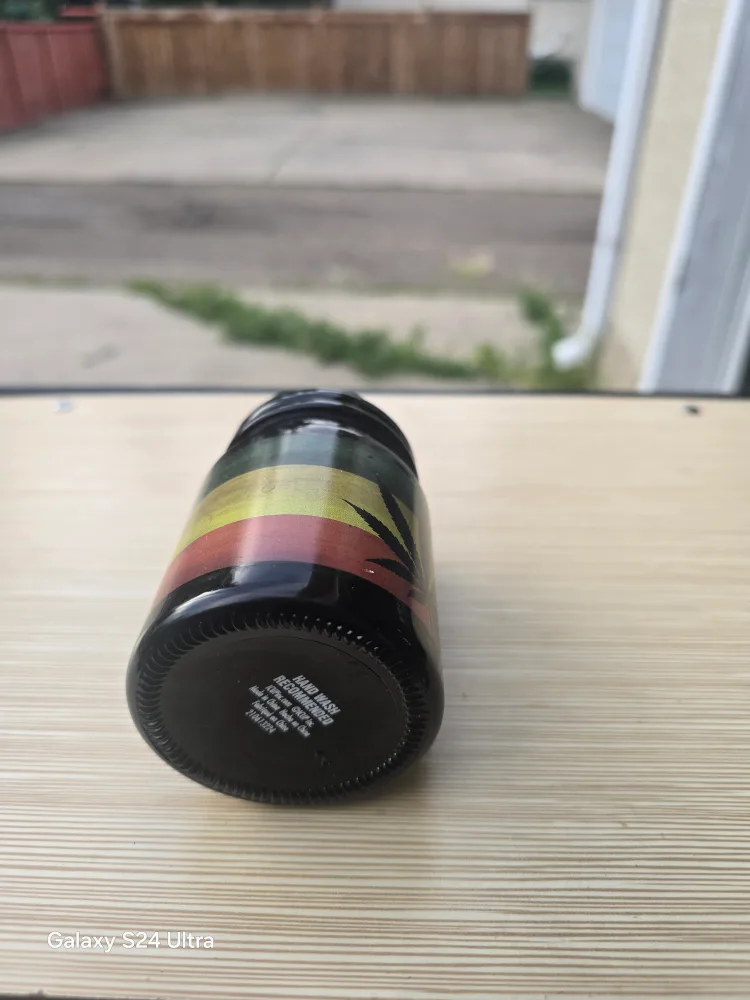 Glass Jar with Leaf Design image indicator(4)