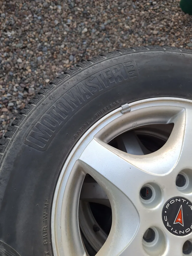 Motomaster AW II Tires on Pontiac Rims - 215/70R15 image indicator(3)