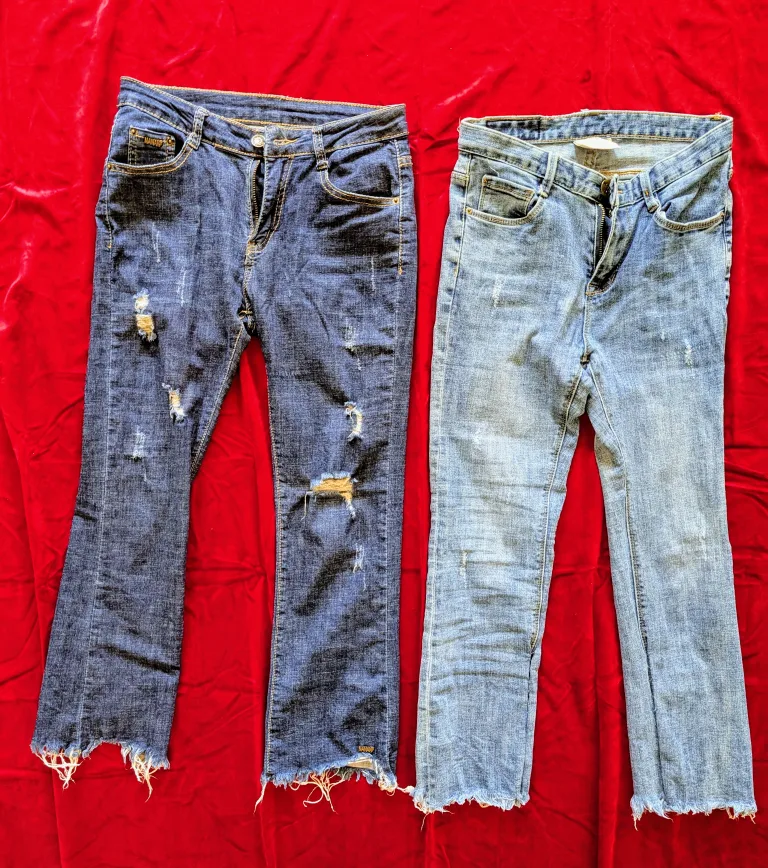 Two Pairs of Distressed Denim Jeans both $5 image indicator(2)