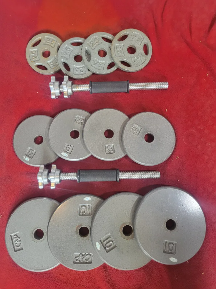 ADJUSTABLE  DUMBBELLS 1" HOLE  70LBs.   4-10s.  4-5s.   4-2.5s thumbnail