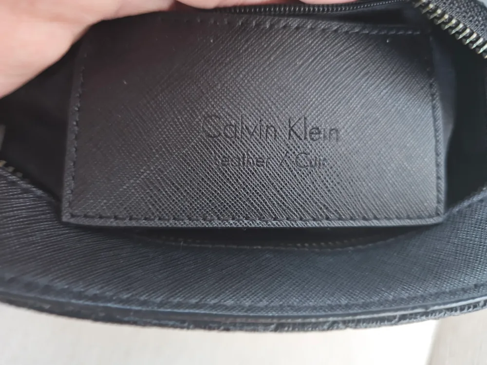 Calvin Klein Black & Red Crossbody Bag image indicator(9)
